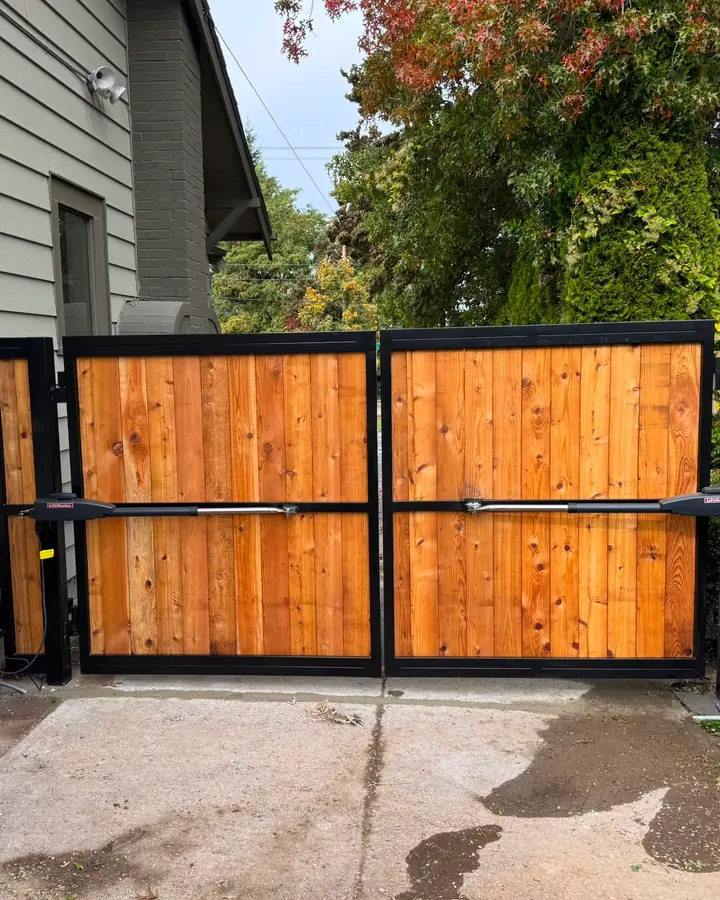 Automated cedar double swing gate with dual LiftMaster arm operators — Interstate Gate Repair